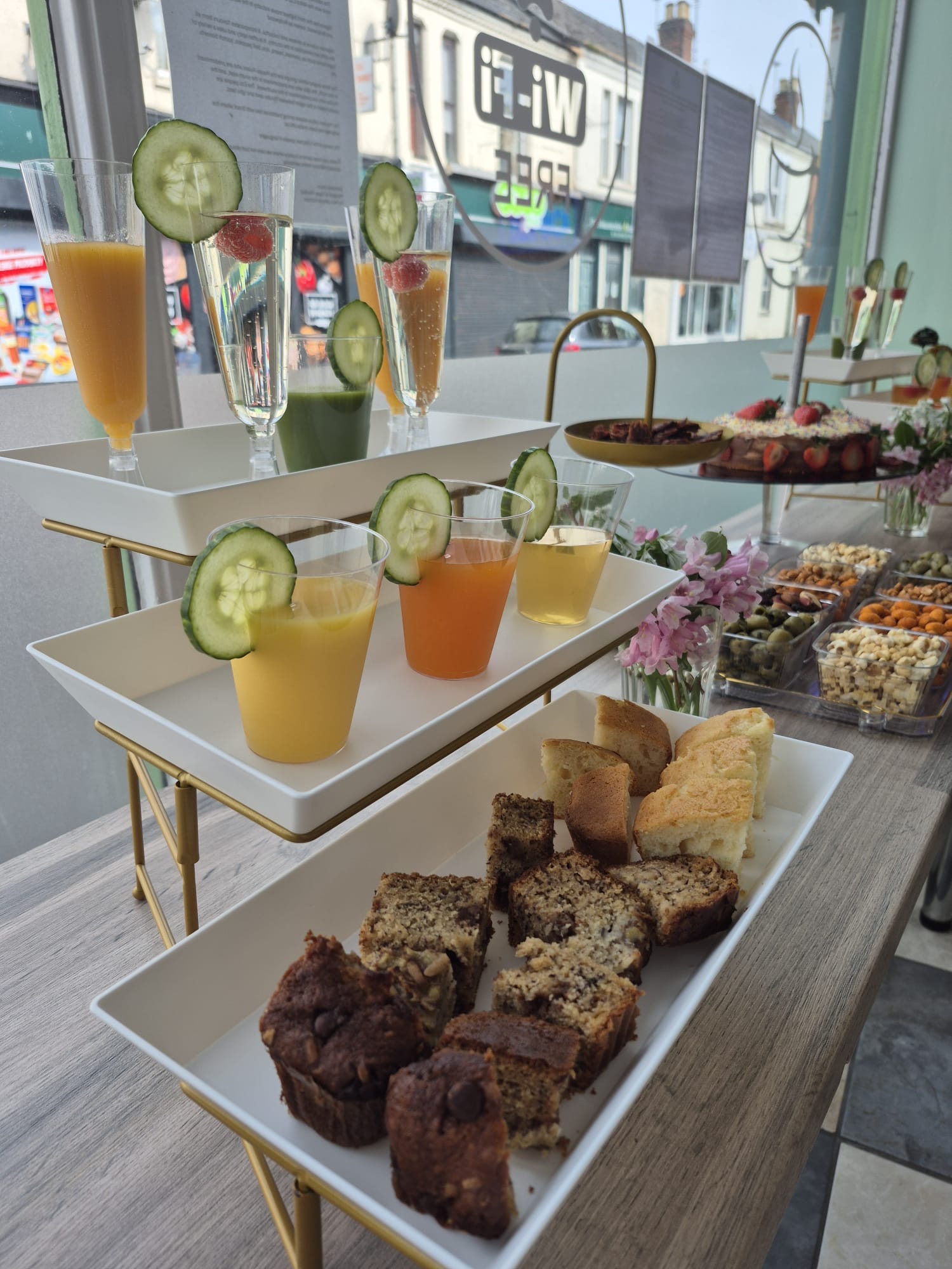 Celebration drinks, cakes and snacks arranged for guests